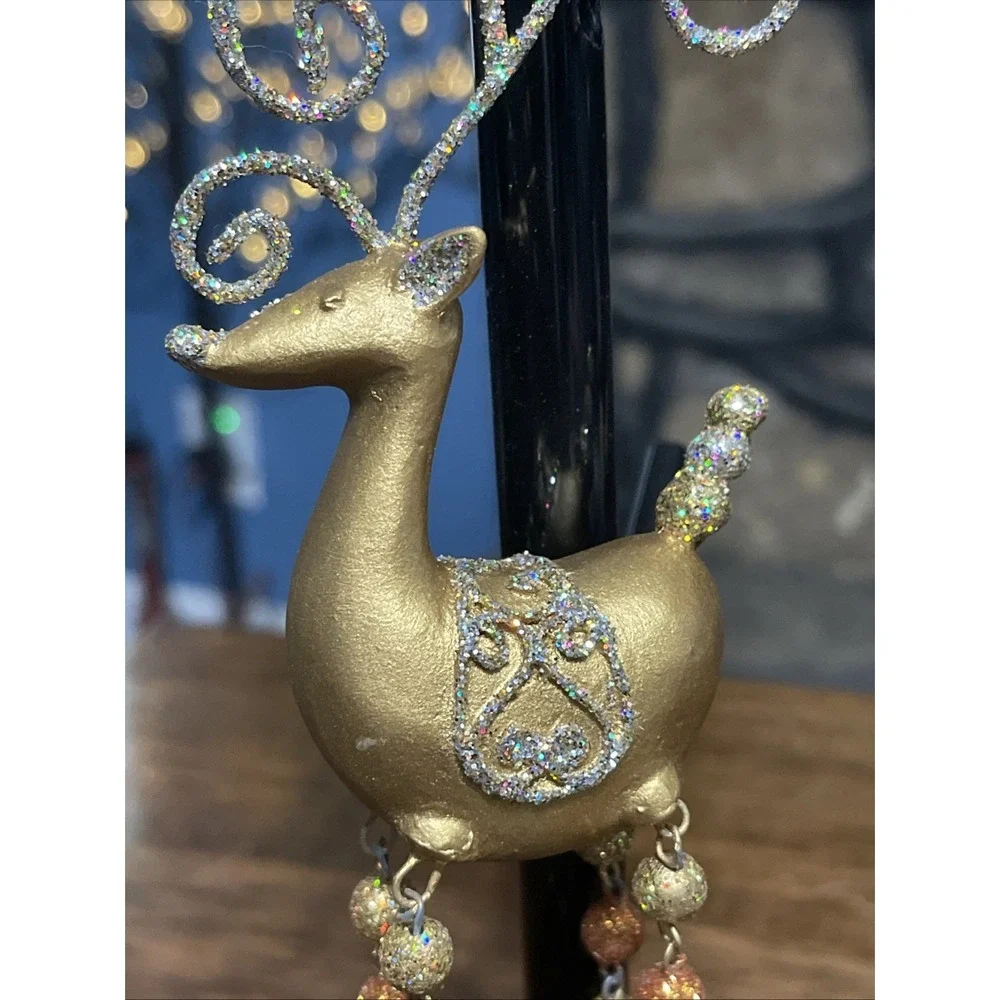 Pier 1 Reindeer Christmas ornament glittery gold style with beaded dangly legs
